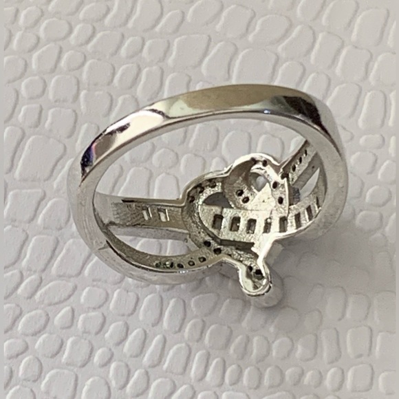 Enhanced Blue Sapphire And Cubic Zirconia Accent Swirled Heart Ring in Sterling - Picture 7 of 13